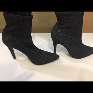 Brash black lurex boots stretch
